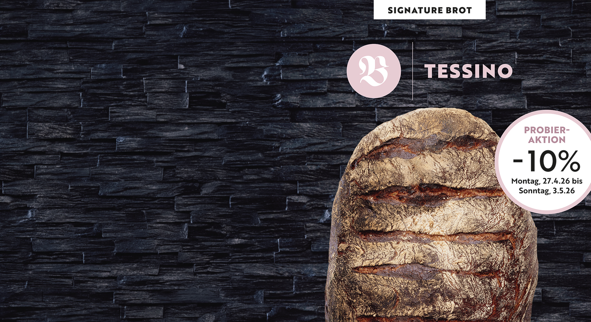 Ein Laib Tessino vor eine schwarzen Steinwand